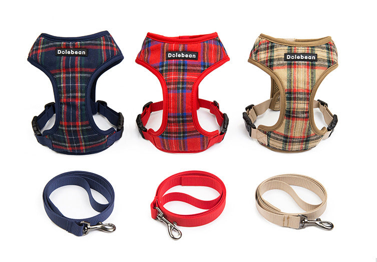 Red, navy and beige plaid harnesses with their matching leashes